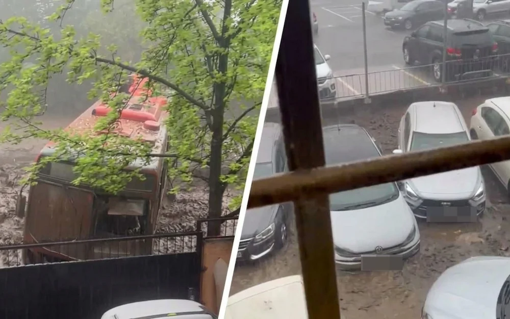 Aluvión en Las Condes arrastra autos y micros en su paso por la comuna